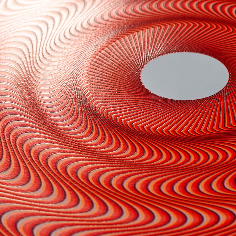 Mechanical drawing “Guilloché Haute Amplitude Orange” with dynamic high-amplitude guilloché patterns.