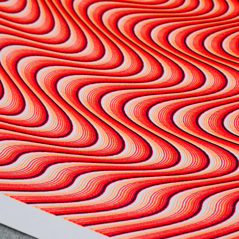 Mechanical drawing “Guilloché Haute Amplitude Orange” with dynamic high-amplitude guilloché patterns.