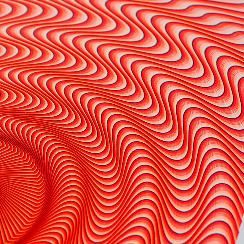 Mechanical drawing “Guilloché Haute Amplitude Orange” with dynamic high-amplitude guilloché patterns.